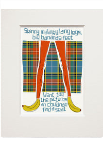 Skinny malinky long legs, big bananae feet (on tartan) – small mounted print - Indy Prints by Stewart Bremner